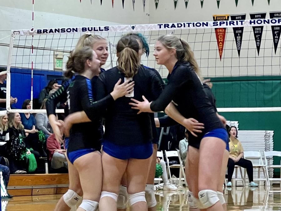 Girls varsity volleyball huddles during the second set against Sonoma Valley, Oct. 29, 2022. Branson quickly won its NCS quarterfinal in three sets.