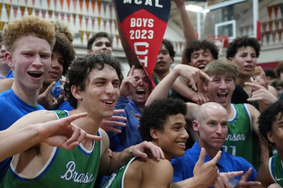 Branson boys basketball celebrates after winning the MCAL title at Redwood High School on Feb. 10, 2023. The Bulls defeated Redwood during a nail-biting overtime.