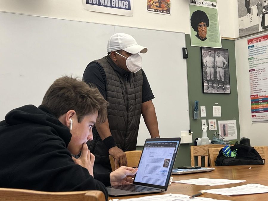 Malik Ali looks over a sophomore history class in February 2023. Another Ali class, History of Hip-Hop, will become a cross-registered course.