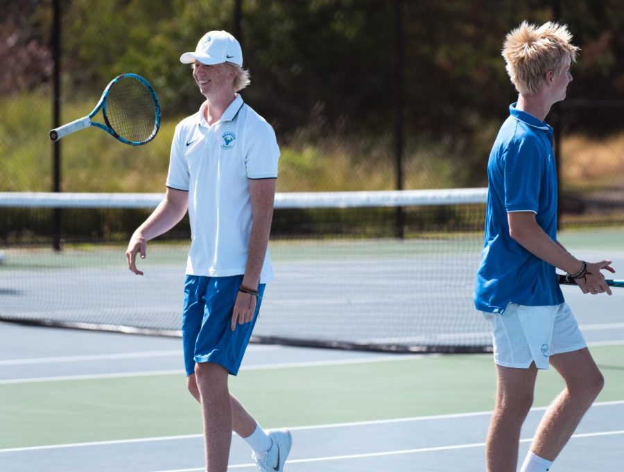 Peter Stovell, left, flips his racket at College of Marin on May 9, 2023. Branson boys tennis finished the season undefeated, claiming MCAL and NCS titles.