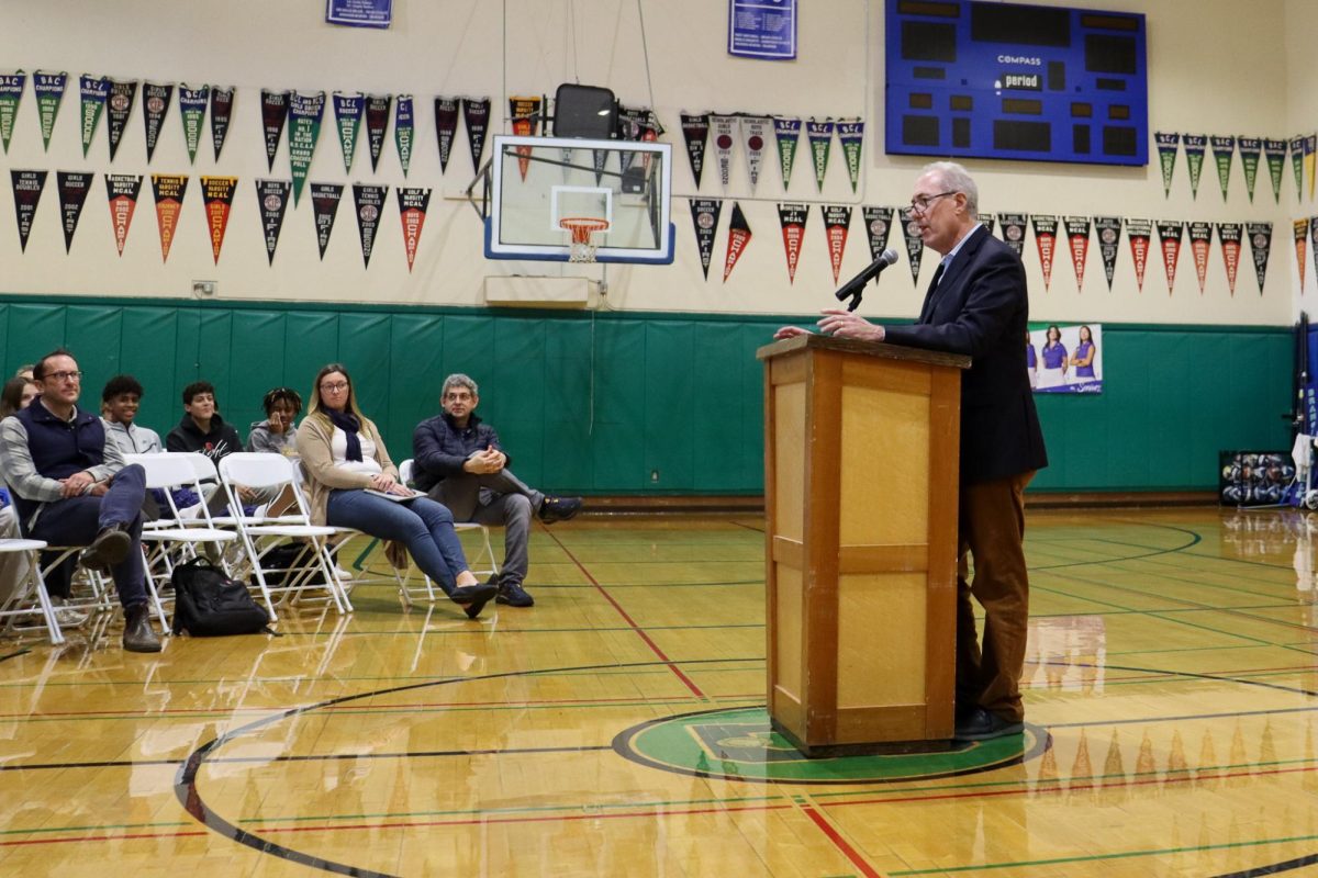 Mike Froman 80 speaks during a Dec. 14 assembly. Froman worked alongside President Barack Obama during his presidency.