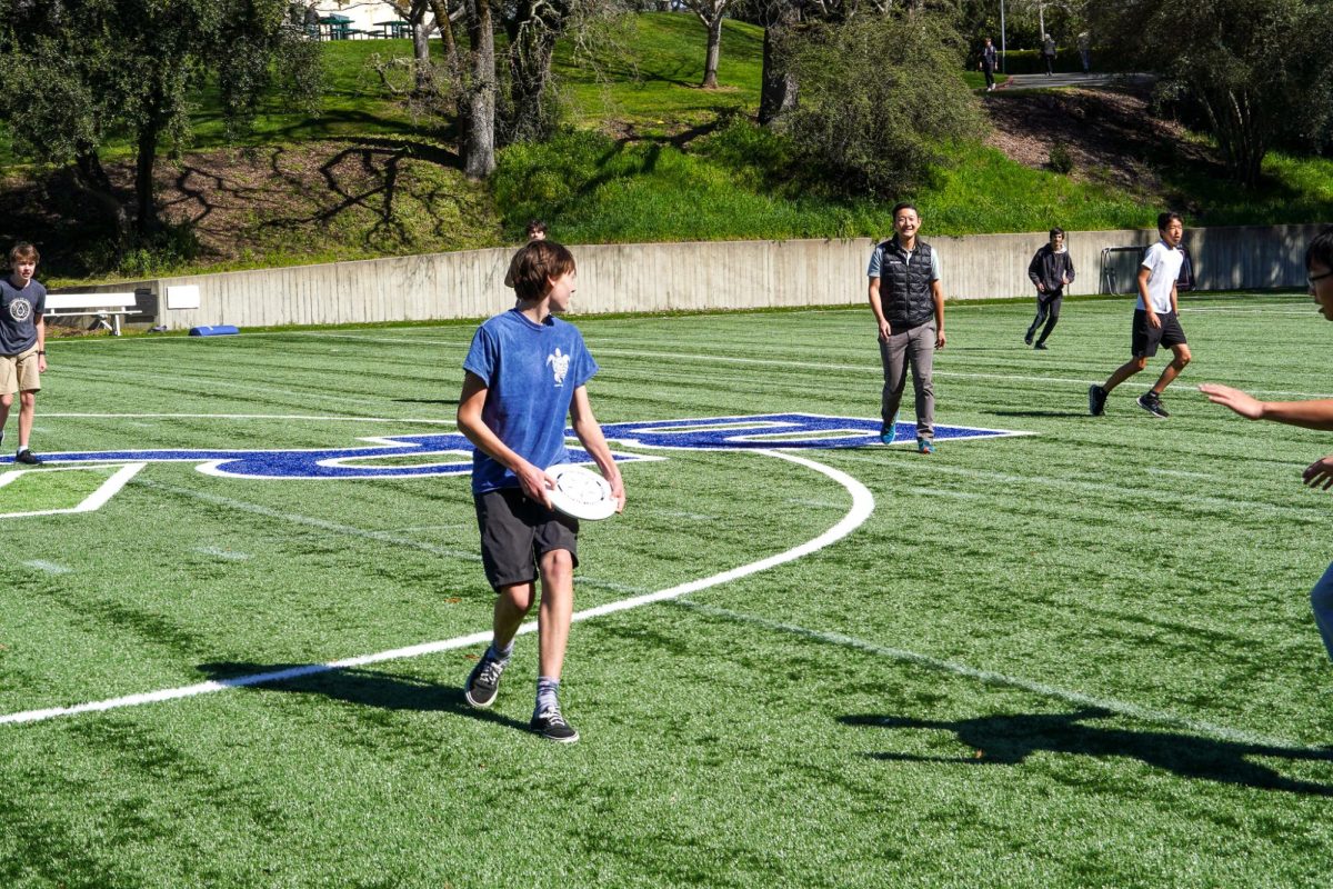 Students play Ultimate Frisbee on Tom Ryan Field. The Ultimate Frisbee Club is one of the many clubs offered at Branson.