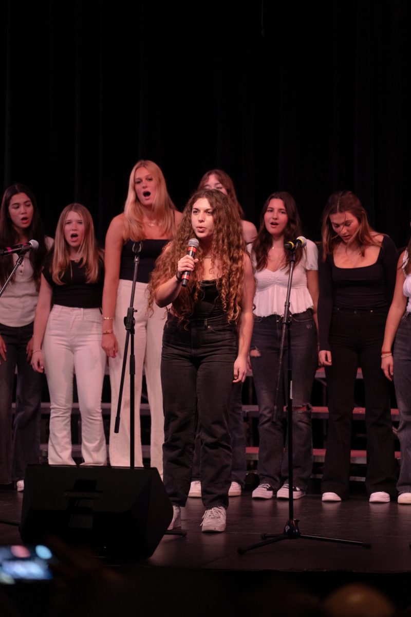 Hayley Yoslov '23 sings solo at Gospel Night two years ago. Last year marked the 30th anniversary of the tradition at Branson.