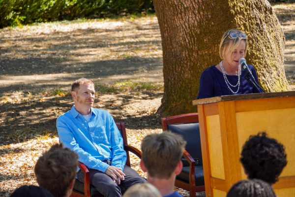 English Department Chair Giles Scott and Head of School Chris Mazzola at Convocation. Scott was nominated by the community to speak at Convocation this year.