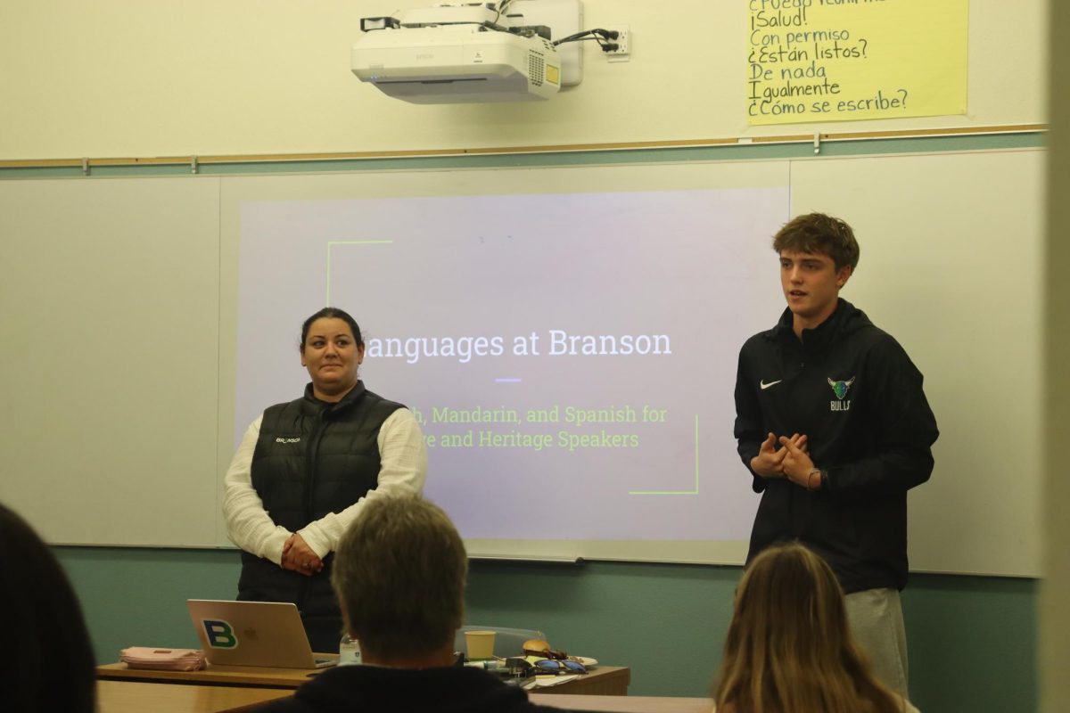 Spanish teacher Donatella D'Aguanno and Carl Smith '26 speak about language classes at Branson. The new format of open houses for prospective families highlights teacher-student collaboration at Branson.