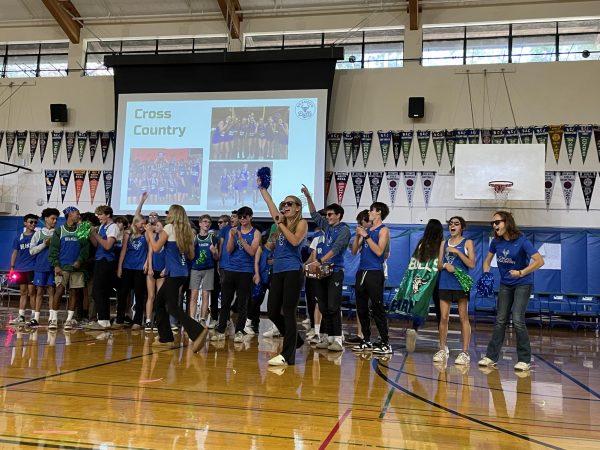 Cross-country displays team spirit in friendly competition during the fall pep rally. New rules against hazing made the event tamer than in years past.