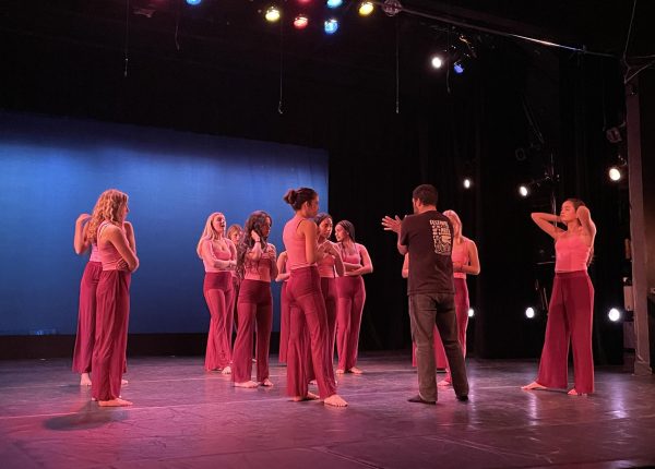 Dance teacher Alex Escalante gives instruction to dance students during rehearsal. The annual dance concert, "Heart & Soul," premieres next week on Feb. 6.