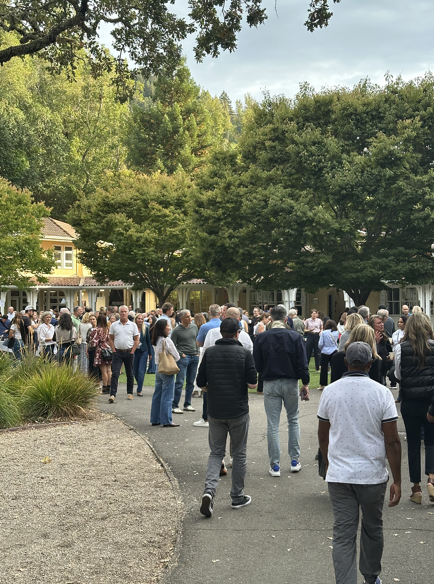 Parents walk around the quad during Branson's Back to School Night.